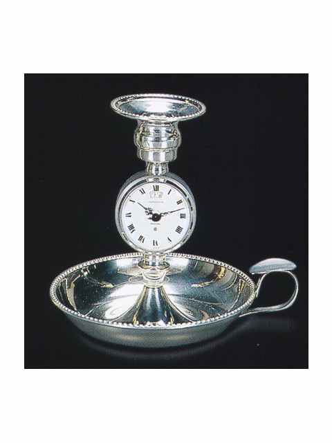 Eight-day going keyless bedside table timepiece with exclusive alarm mechanism, designed as a candlestick. Jaeger-LeCoultre, made in the 1960's. — Antique Clocks Price Guide