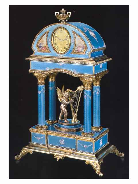 Silver gilt and enamel, eight-day going table timepiece, designed as a temple of love, in original green leather fitted box. Haas Neveux & Cie, Geneve, circa 1910. — Antique Clocks Price Guide