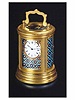 Gilt brass and enamel, oval eight-day going small carriage clock. French, circa 1890.