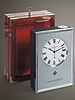 "Naviquartz", mahogany electronic chronometer with center-seconds with original certificate and manual. Patek Philippe & Cie., circa 1973.