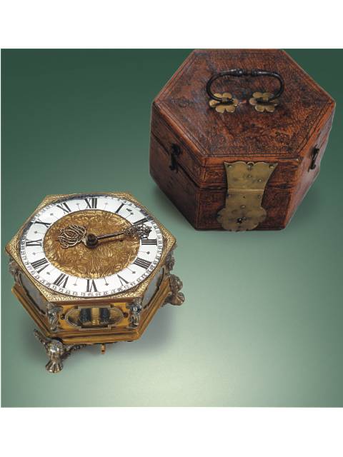 Fine and very rare gilt and silvered bronze three-train, hour- and quarter-striking, large horizontal table clock in original leather fitted box. Christianus Caroll, Ksningsberg, circa 1660. — Antique Clocks Price Guide