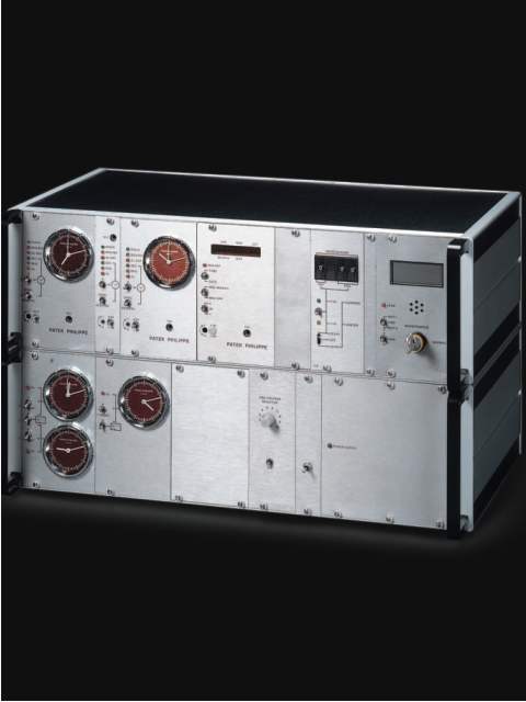 Very fine integrated Electronic Master Clock System, two-module tower. Patek Philippe & Cie., Geneve, circa 1980. — Antique Clocks Price Guide