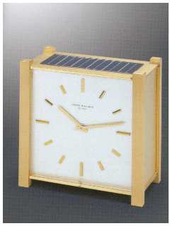 Solar-powered electric table clock in original fitted box. Patek Philippe & Cie. made in the 1970's. — Antique Clocks Price Guide