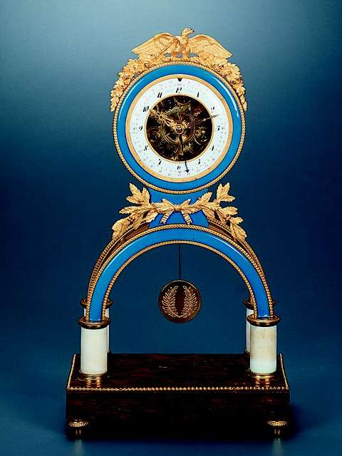 Gilt bronze, grillotte red marble and enamel eight-day going, hour and half-hour striking skeleton clock with Republican calendar. Ridel a Paris, circa 1805, — Antique Clocks Price Guide