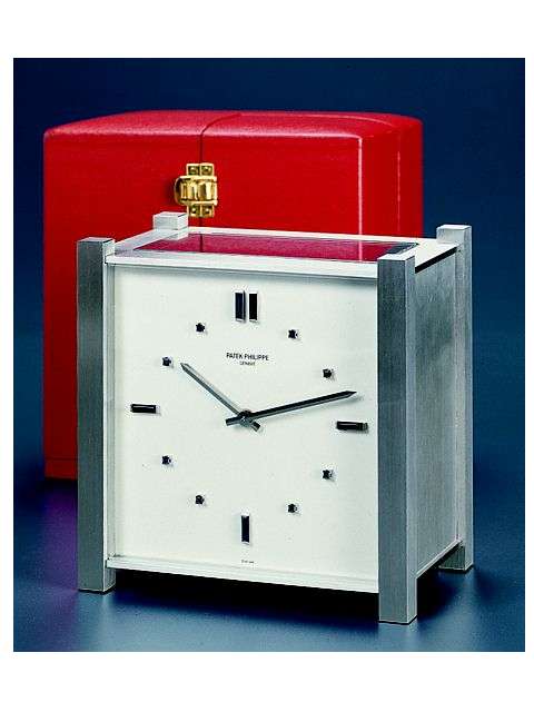 Solar-powered electric table clock in original fitted box. Patek Philippe & Cie. circa 1965. — Antique Clocks Price Guide