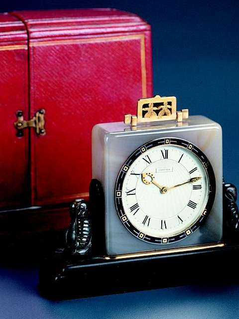 18K gold, agate, labradorite, and bakelite eight-day going desk clock, Cartier, Paris, circa 1920. — Antique Clocks Price Guide