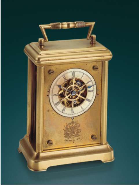 Fine and very rare, brass, skeletonized, eight-day going carriage clock with rotary regulator. Waterbury, Connecticut, circa 1885. — Antique Clocks Price Guide