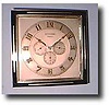 French Art Deco silvered brass and black enamel 8-day calendar desk clock, c. 1920