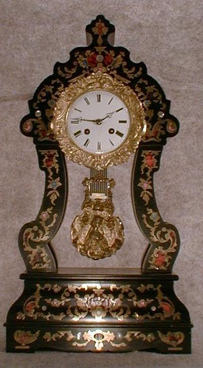 FRENCH EMPIRE MANTEL CLOCK. CIRCA 1850'S. — Antique Clocks Price Guide