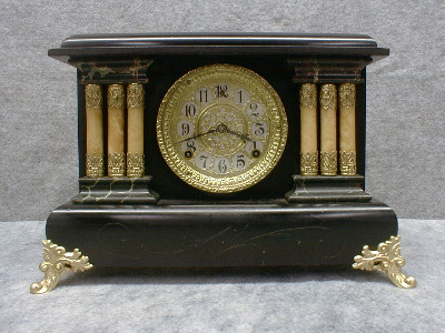 GILBERT BLACK MANTEL CLOCK "AUSTRIA" IN AN ENAMELED WOOD CASE. CIRCA 1906 — Antique Clocks Price Guide