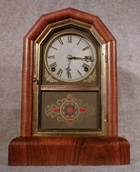 THIS IS A DORIC SHELF CLOCK, THE "COMET" BY THE GILBERT CLOCK CO.,CIRCA 1879-85. — Antique Clocks Price Guide