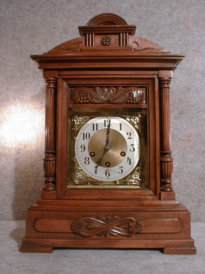 JUNGHANS CABINET CLOCK IN A WALNUT CASE. CIRCA 1900-1915. — Antique Clocks Price Guide
