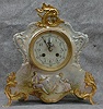 FRENCH PORCELAIN MANTLE CLOCK IN 3/4 SIZE. CIRCA 1889-1900.