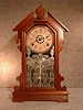 THIS IS A WALNUT SHELF CLOCK, "AUSTRALIA", BY THE ANSONIA CLOCK CO.