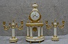 A FRENCH CLOCK AND CANDELABRA SET. CIRCA 1900-1910.