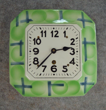 German Ceramic Plate Clock In A Green And Blue Deco Motif With Black Arabic Numbers. Circa 1950'S. — Antique Clocks Price Guide