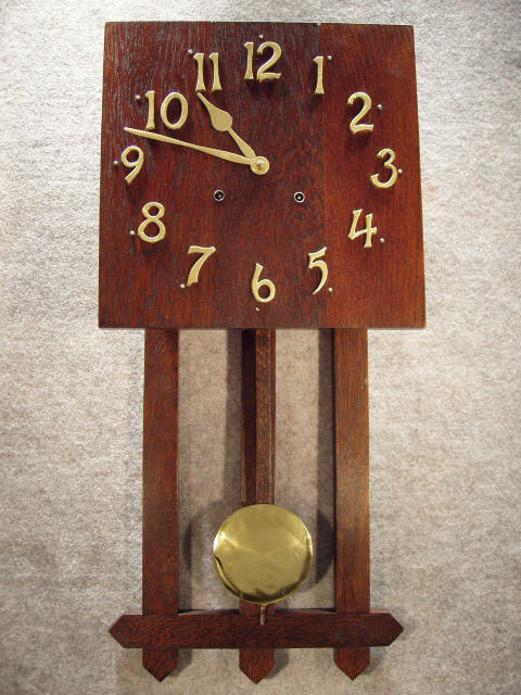 Mission Oak Wall Clock, The "Monterey", In A Dark Oak Case By The Ingraham Clock Co., In Bristol, Ct. Circa 1911-1915 — Antique Clocks Price Guide