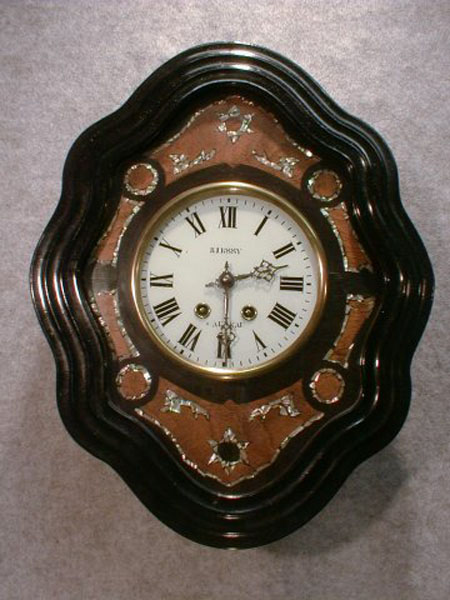 Dwarf French Picture Frame Wall Clock In A Squiggle Frame. Circa 1900. — Antique Clocks Price Guide