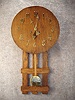 "Gordon" Model Round Top Mission Oak Wall Clock By The New Haven Clock Co. Circa1910-1915.