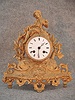 French Mantel Clock In A Gold Finish Spelter Case.