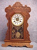 Waterbury Pressed Oak Shelf Clock, "Felix". Circa 1900-1910.