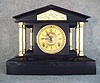 Black Cast Iron Mantel Clock "Loire", By The Ansonia Clock Co., Brooklyn, N.Y. Circa 1900-1910.