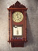 This Is An Anglo/American Wall Clock In A Mahogany Case With Full Turned Spool Columns And Floral Carving On The Bottom Of The Case And A New Carved Crown Piece. Circa 1880'S.