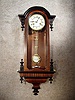 German Arched Top Black And Tan Cased R-A Style Wall Clock By Junghans. Circa 1890'S.