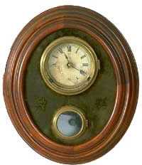 Kroeber Oval Wall Clock, — Antique Clocks Price Guide