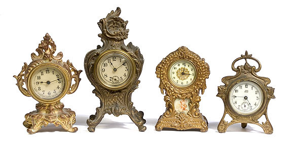 Lot of Four Metal Case Novelty Clocks, — Antique Clocks Price Guide