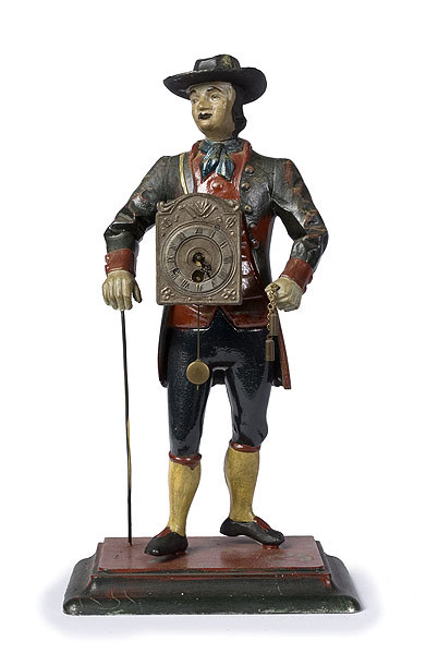 Figural Metal Clock, The Clock Peddler, — Antique Clocks Price Guide