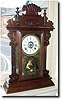 Walnut Cased Gingerbread Clock, circa 1900