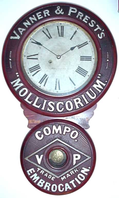 Baird clock, Vanner and Prests Molliscorium (horse liniment), circa 1895, signed works E. Baird Clock Co., Plattsburgh NY. — Antique Clocks Price Guide
