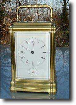 A French gilt brass carriage clock with quarter striking on two bells — Antique Clocks Price Guide