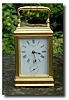 A Drocourt carriage clock in a frosted-gilt cannelee case, with an English Frodsham escapement.