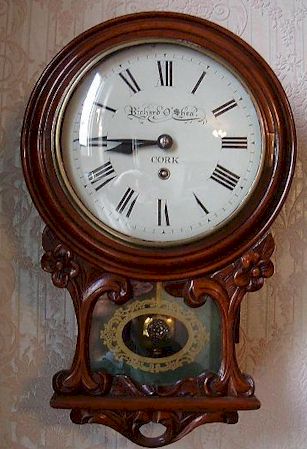 An unusual Irish drop dial clock, the 8 inch re-painted dial signed for O'Shea of Cork. — Antique Clocks Price Guide