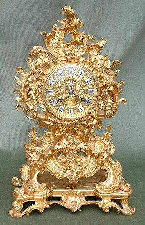 A French gilt bronze clock in rococo style. — Antique Clocks Price Guide