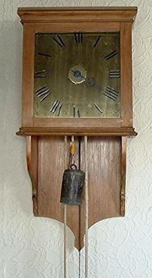 A late eighteenth century single-handed hooded wall timepiece with alarm. — Antique Clocks Price Guide