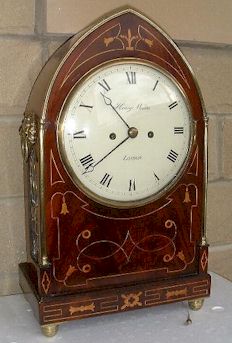 A Regency mahogany lancet cased bracket clock. — Antique Clocks Price Guide