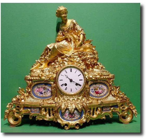 French gilt bronze mantel clock with blue porcelain panels, circa 1880 — Antique Clocks Price Guide