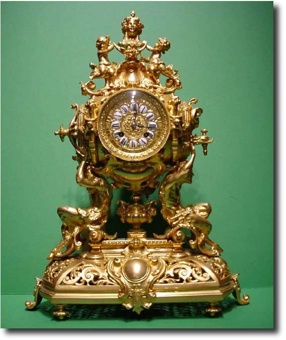 French gilt ormolu figural mantel clock, circa 1860 — Antique Clocks Price Guide