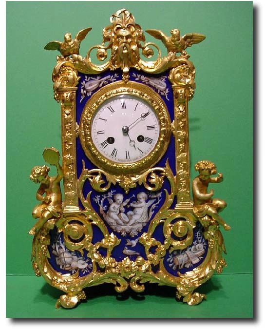 French gilt bronze and blue porcelain paneled mantel clock — Antique Clocks Price Guide