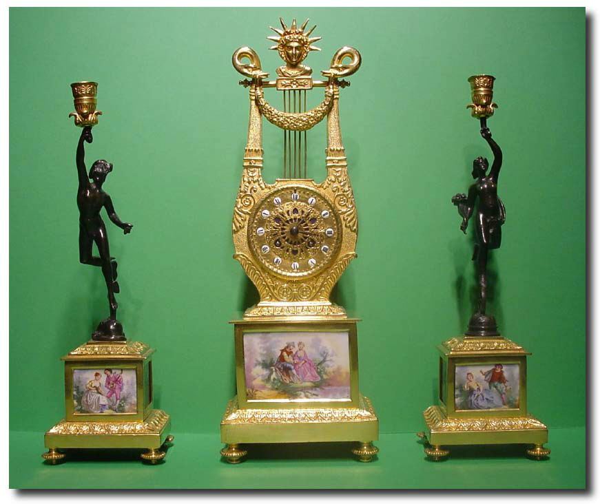 French gilt bronze and porcelain panelled lyre 3 piece clock garniture, circa 1860. — Antique Clocks Price Guide