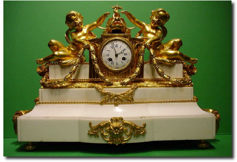 French white Carrera marble and gilt bronze mantel clock, circa 1870 — Antique Clocks Price Guide