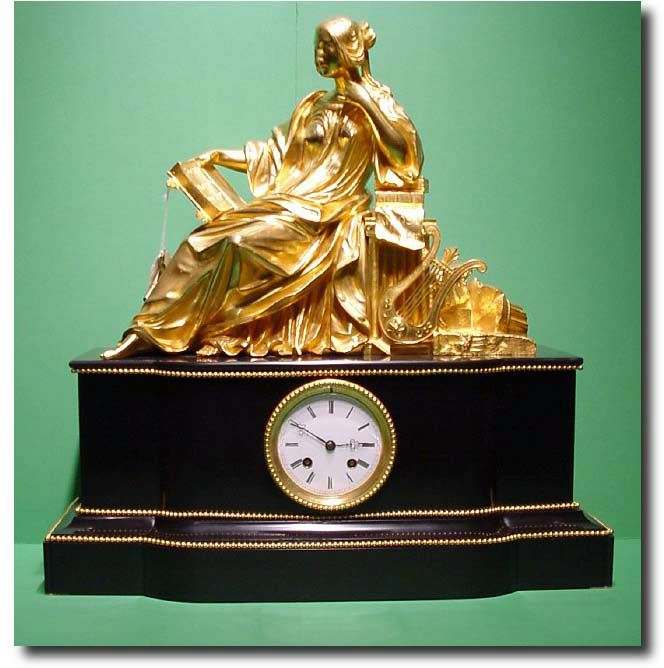 French black marble and gilt bronze figural mantel clock, Circa 1860 — Antique Clocks Price Guide