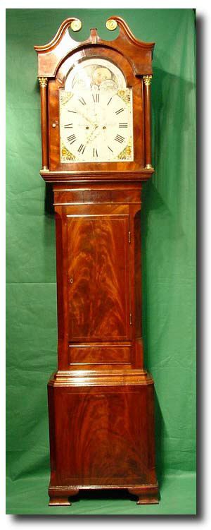 English mahogany breakarch painted dial moonroller longcase clock, circa 1830 — Antique Clocks Price Guide