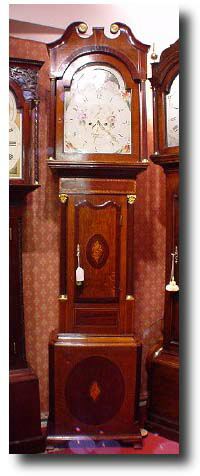 English oak and mahogany 8-day moonroller painted dial longcase clock, circa 1830 — Antique Clocks Price Guide