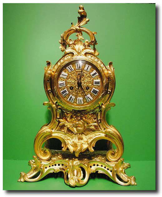 French Louis XV style gilt-bronze mantel clock, circa 1870 — Antique Clocks Price Guide