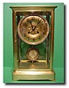 French four glass clock with signed ivory miniature pendulum, circa 1880.