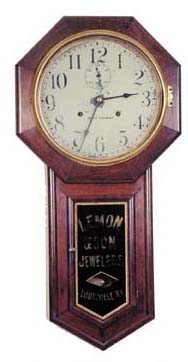 Seth Thomas "World", ca 1909. Advertising on the glass, "Lemon & Son Jewelers, Louisville, Ky". — Antique Clocks Price Guide